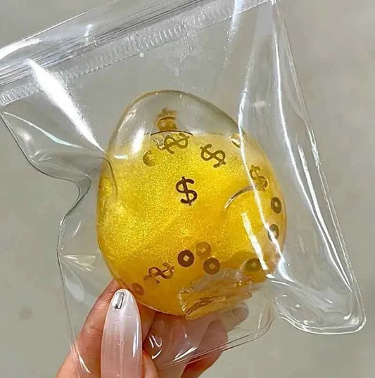 
Quicksand Egg Squishy – Golden Quicksand Egg