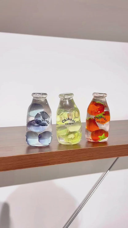 Przezroczyste butelki squishy CHIBOKI — kryształowe i sodowe wzory